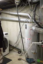 Utilities featuring gas water heater and washer / dryer