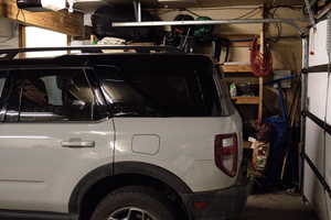 Garage featuring a garage door opener