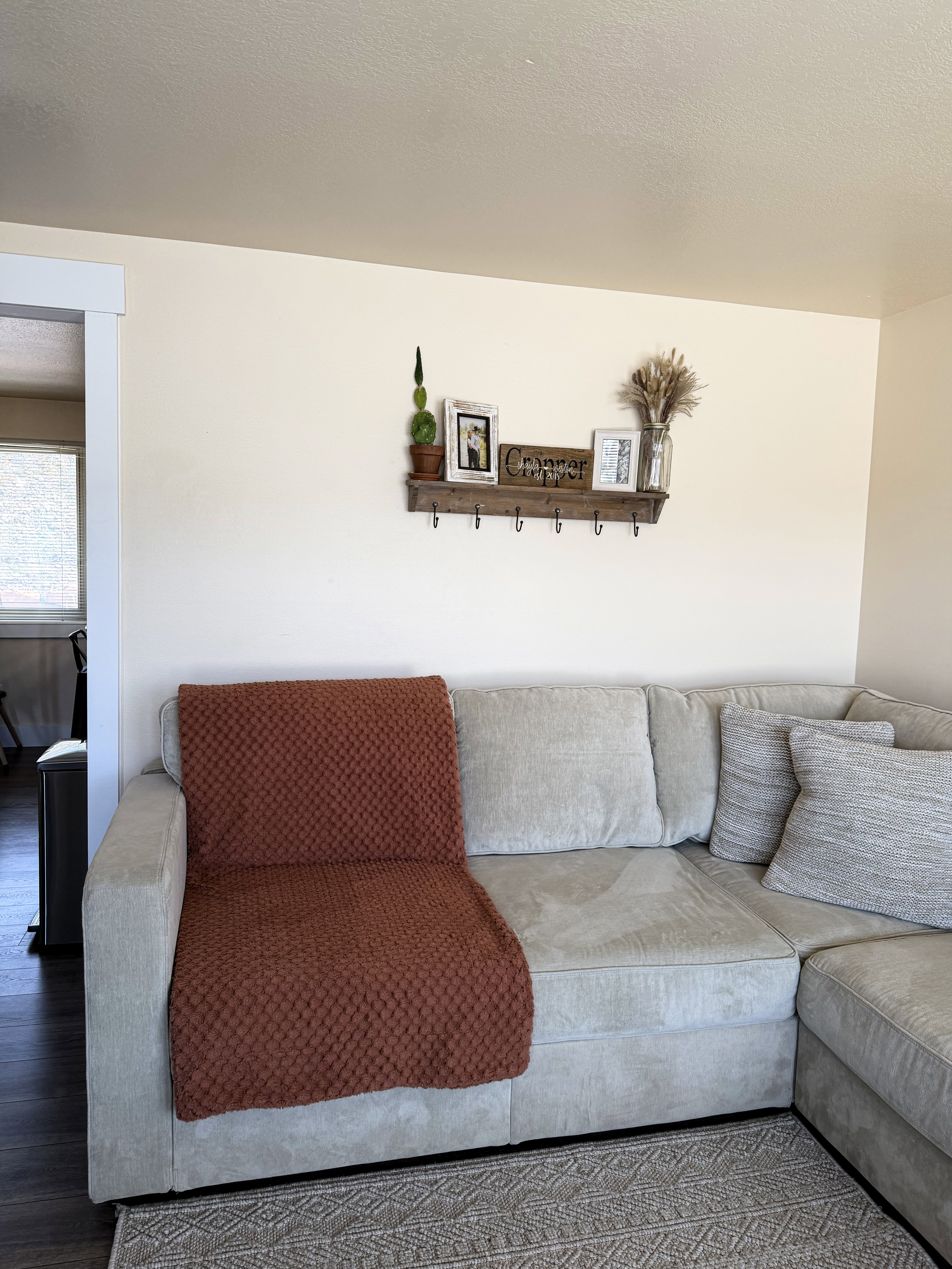 Living area featuring a textured ceiling and wood finished floors
