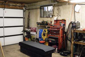 Garage featuring a workshop area