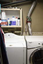 Laundry area featuring washer and clothes dryer