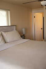 Master bedroom featuring ceiling fan