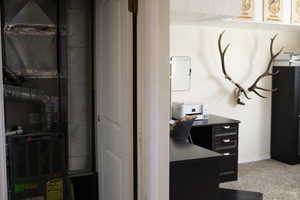 Utility room featuring heating unit and washer / clothes dryer