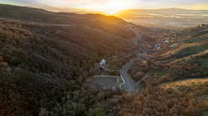 Aerial view at dusk of a mountain view and a wooded view