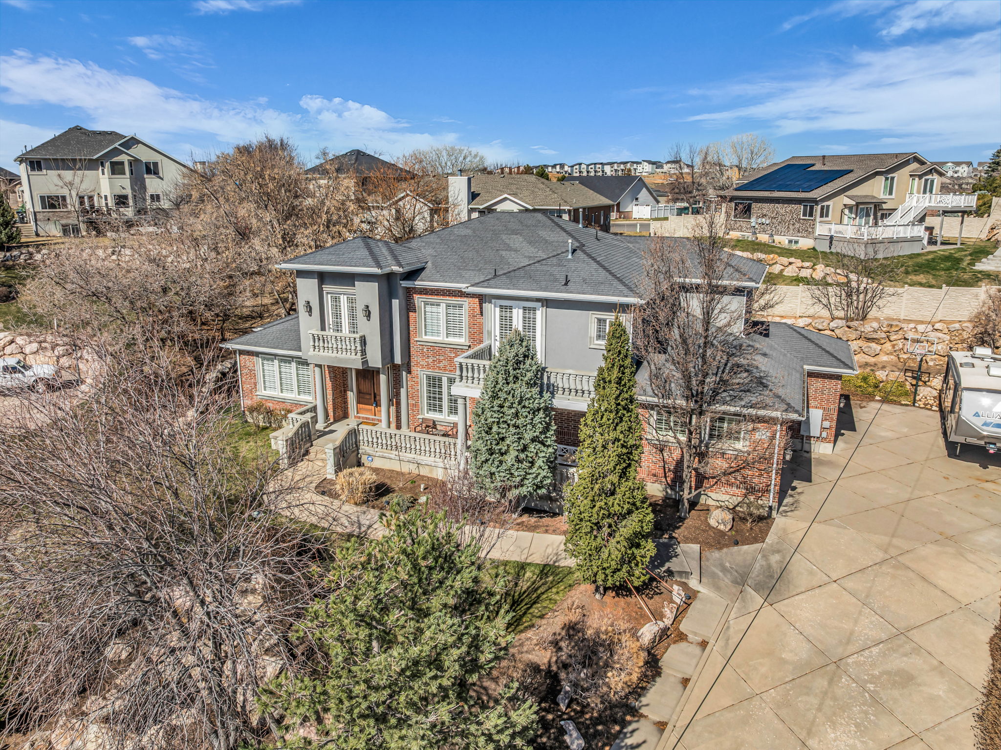 View of front of house featuring brick siding and a residential view