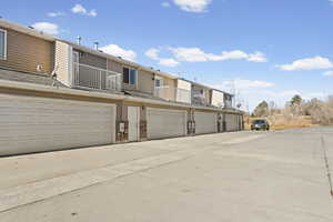 Back of house featuring a balcony