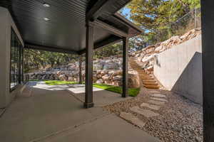 View of patio with stairs