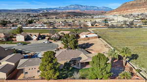 Aerial view of residential area featuring mountains