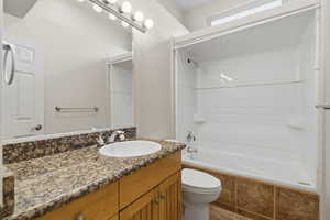 Full bathroom with vanity and shower / bathtub combination