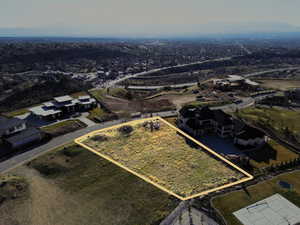 Aerial overview of property's location with property parcel outlined