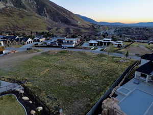 Aerial view at dusk of a residential view and a mountain view