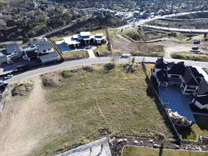 View of property location with nearby suburban area