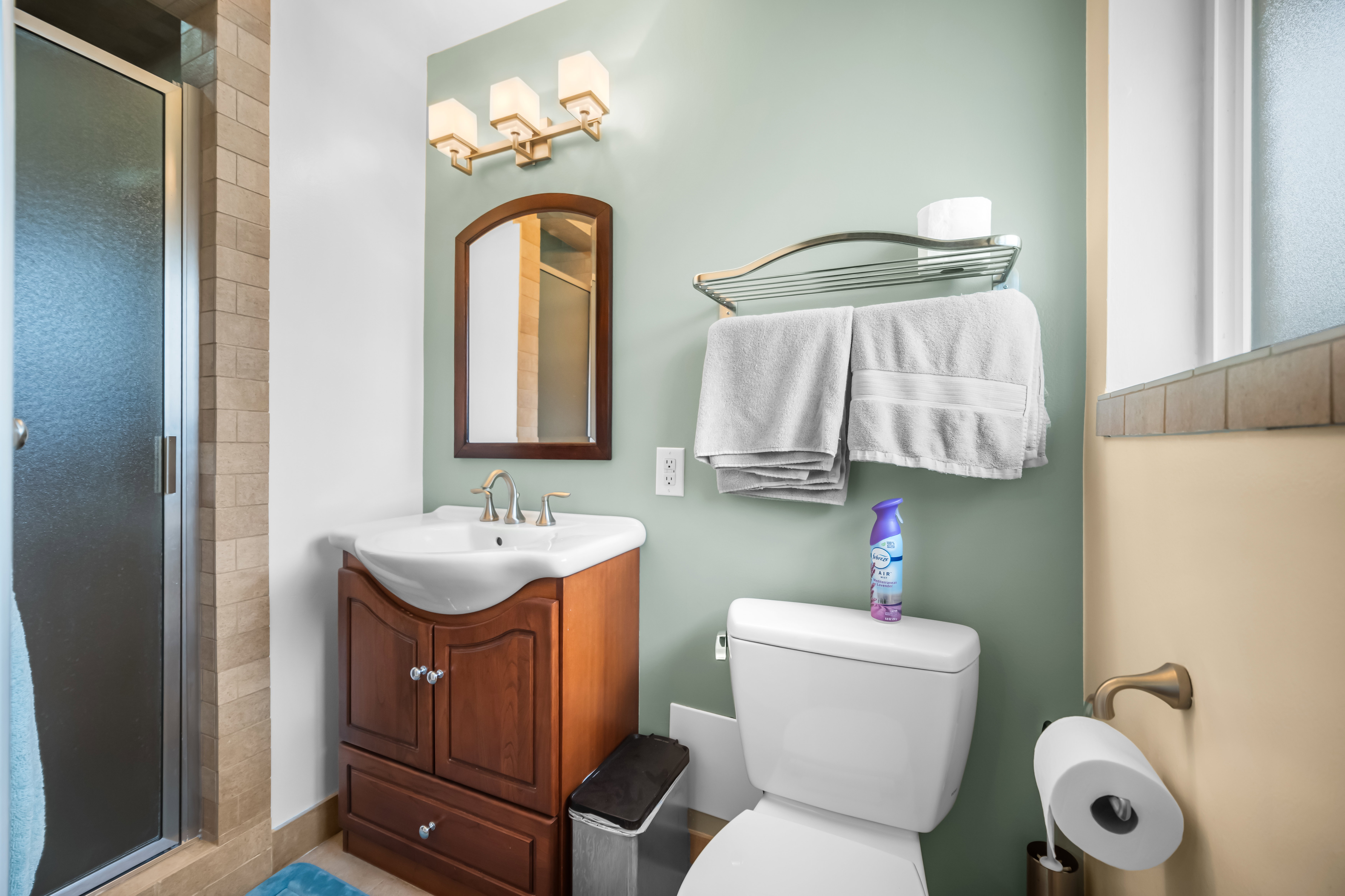 Full bathroom featuring vanity and a stall shower