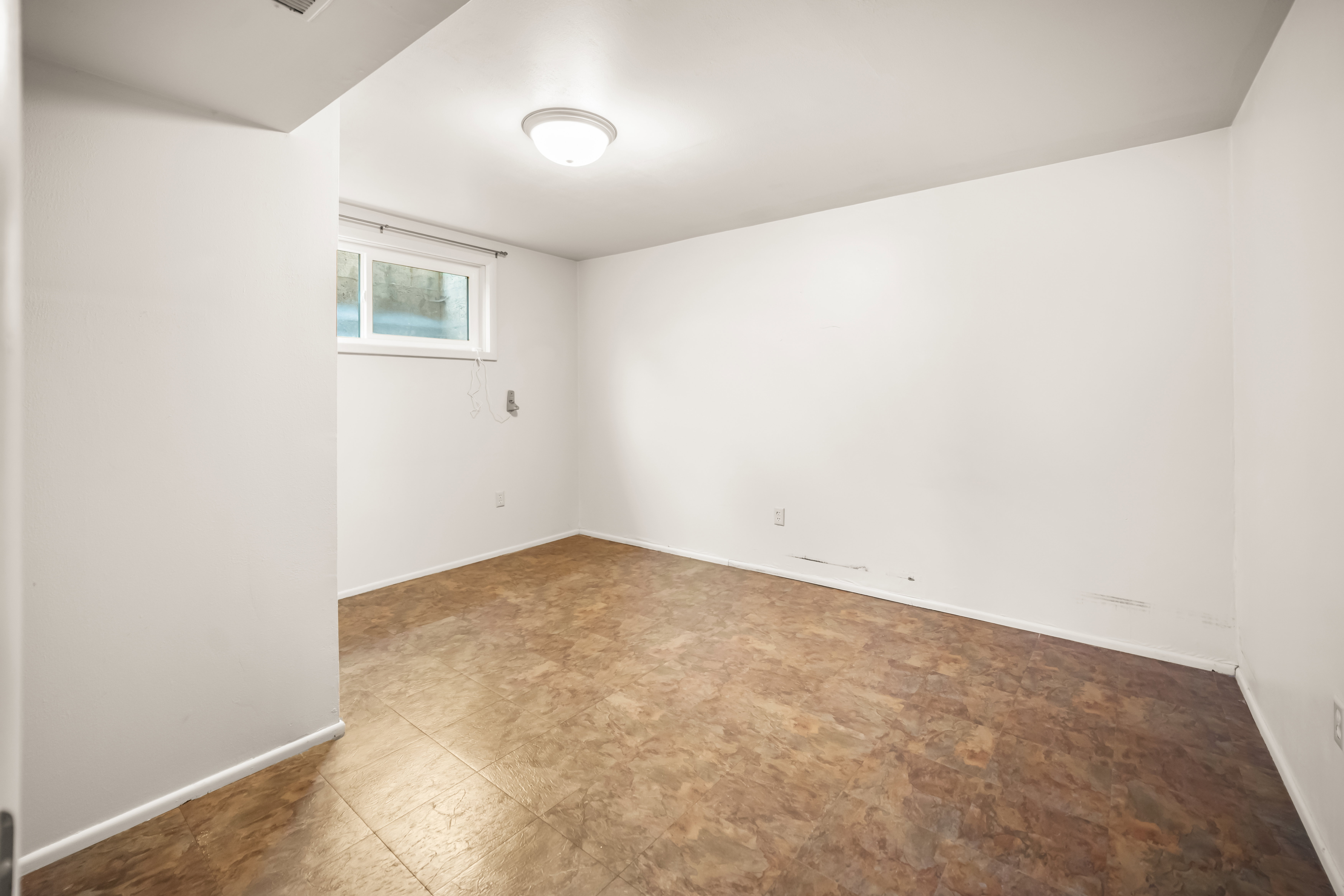 Spare room with baseboards