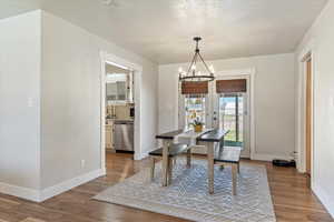Elegant dining room with upgraded light fixture