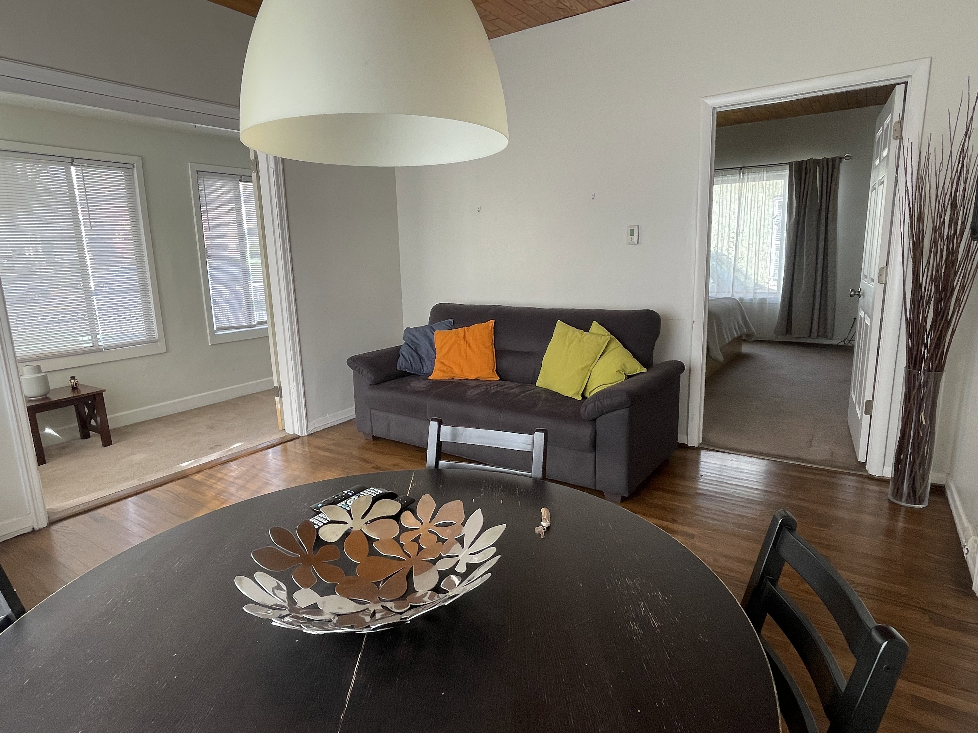Living area featuring wood finished floors and a vaulted wood ceiling