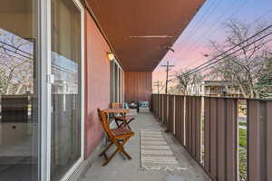 View of balcony at dusk