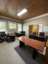 Office featuring crown molding and wooden ceiling