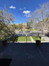 Exterior space with street lights, a residential view, and sidewalks