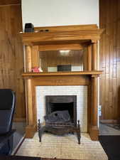 Detailed view of wood walls and a fireplace