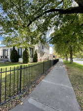 View of front facade with a fenced front yard