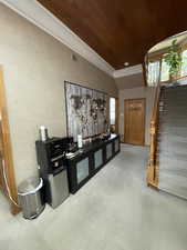 Interior space featuring vaulted ceiling and recessed lighting