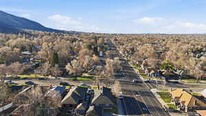 Aerial view of residential area with a mountain backdrop