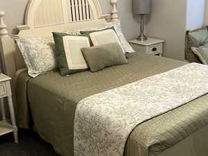 Bedroom with dark carpet