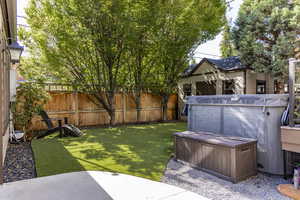 Fenced backyard featuring a patio area