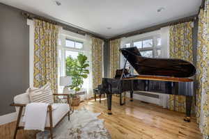 Living area with light wood-type flooring