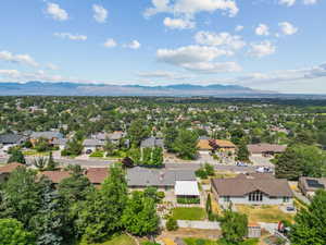 Aerial view of residential area with mountains