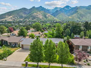 Aerial view of residential area with a mountainous background