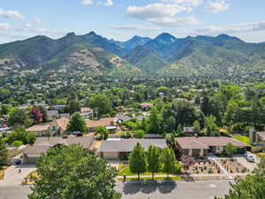 Aerial view of residential area with a mountainous background