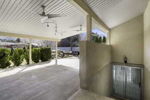 View of patio with a ceiling fan