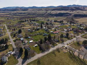 Aerial view of property's location with mountains