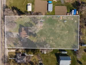 Aerial overview of property's location featuring property boundaries highlighted