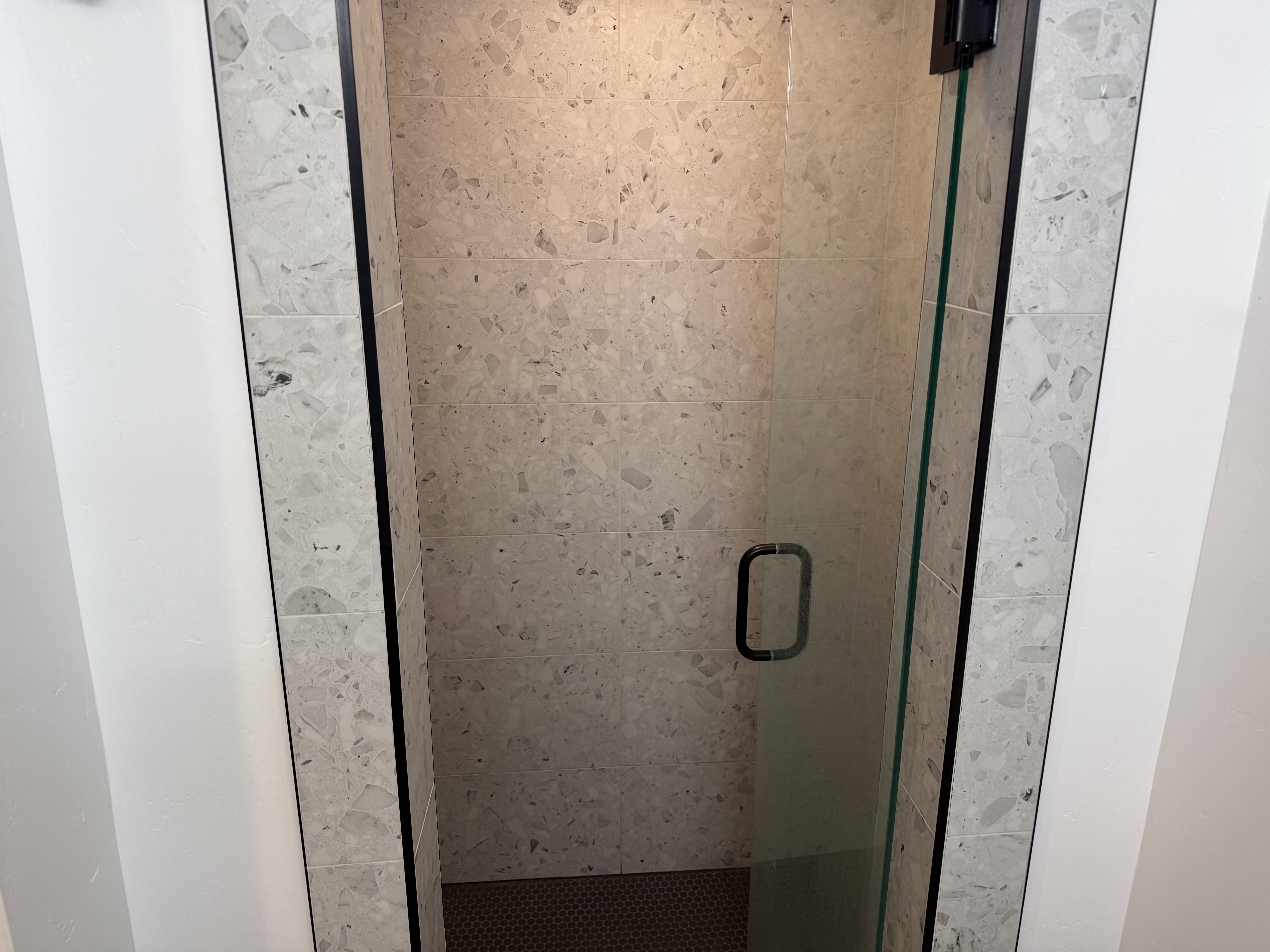 Bathroom view of a shower stall