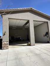 Garage featuring driveway
