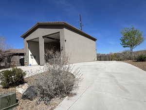View of side of property with stucco siding