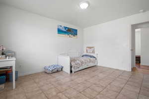 Bedroom with baseboards