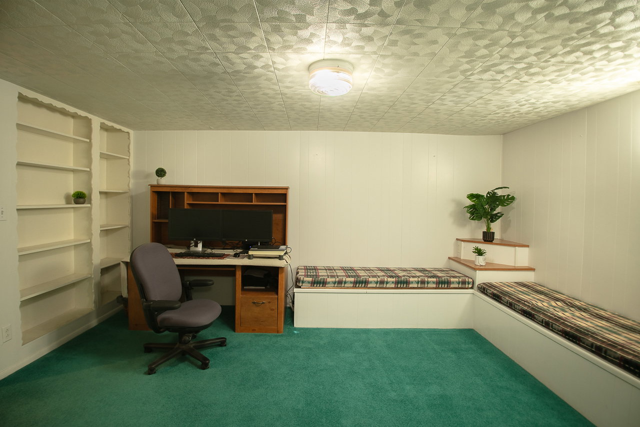 Half of the basement family room--being used as an office space