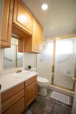 Bathroom on main floor with spacious walk in shower, towel storage and sink