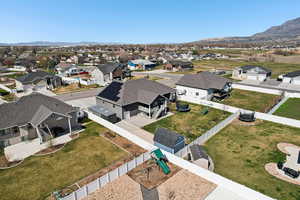 Aerial view of residential area with a mountain backdrop