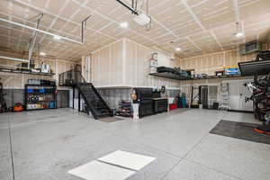 Garage with a heating unit and a garage door opener