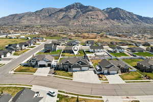 Aerial view of residential area with a mountainous background