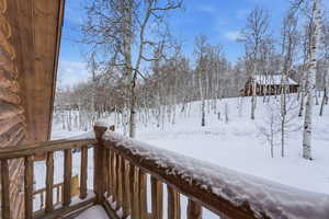 View of yard layered in snow