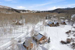 Snowy aerial view with a mountain view