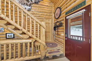 Stairway with log walls