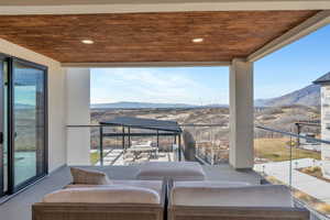 Balcony with outdoor lounge area and a mountain view