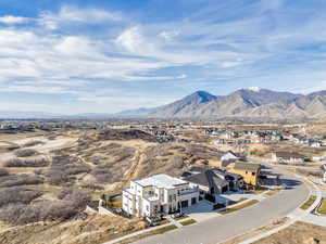 Mountain view featuring nearby suburban area